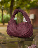 Cartera tejida cuero Vino
